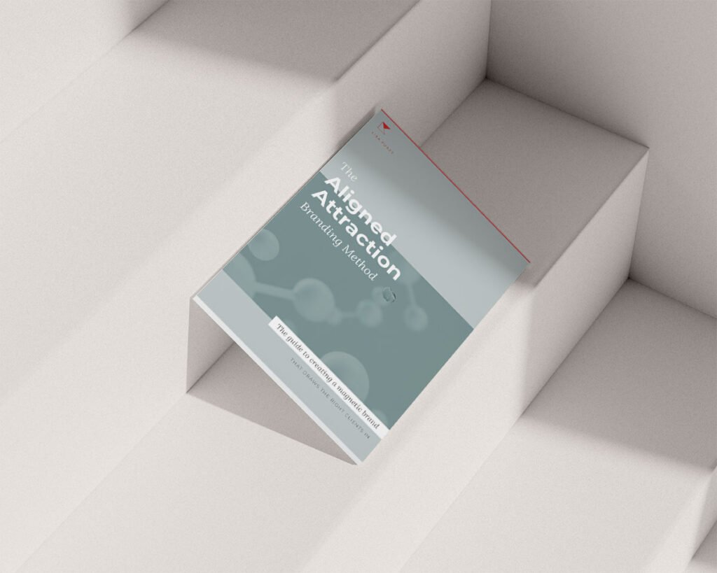Aligned Attraction Branding printout leaning on some stairs